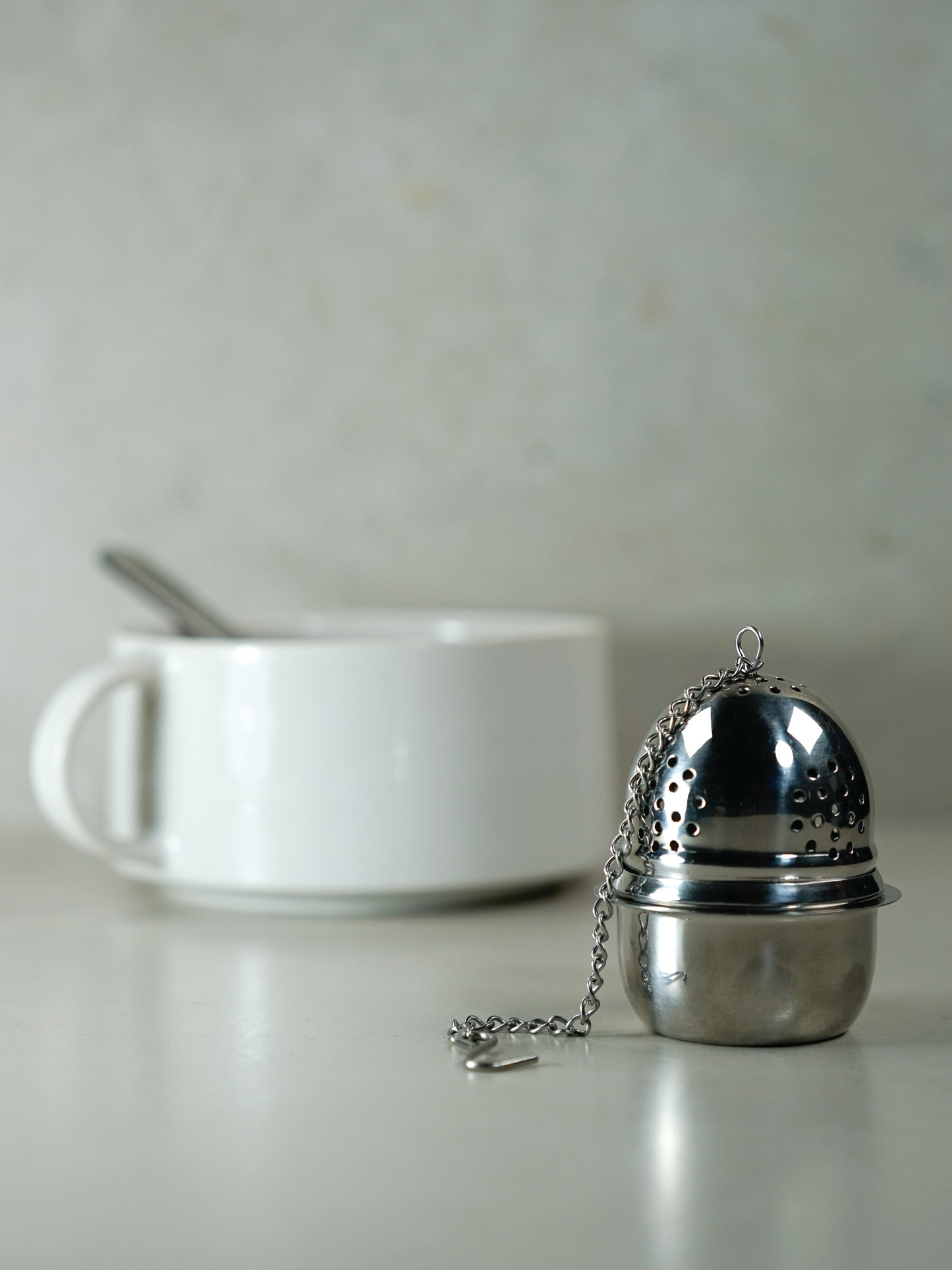 Tea ball with drip cup